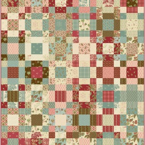 May include: A patchwork quilt featuring a grid of square fabric blocks in a colour palette of deep red, sage green, cream, and soft pink. The blocks display various patterns including floral prints, small geometric shapes, plaids, and stripes.
