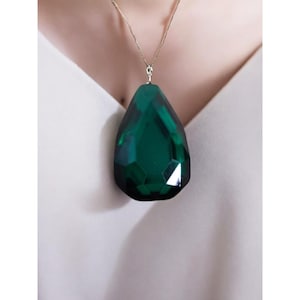 Faceted Emerald Green Glass Pendant with Silver Backing