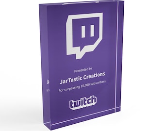 May include: Purple acrylic award plaque with a white Twitch logo and the text "Presented to JarTastic Creations for surpassing 10,000 subscribers".