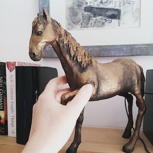 Paper mache horse sculpture