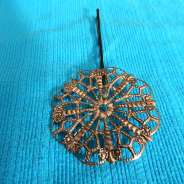 Hair pin 3.00 - This gold-copper hair pin is georgeous just on the side or to embellish a pony tail or half-up.