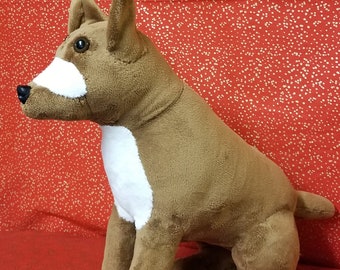 Plush dog with white spots. Base dog for the Mabari hound from Dragon Tales.