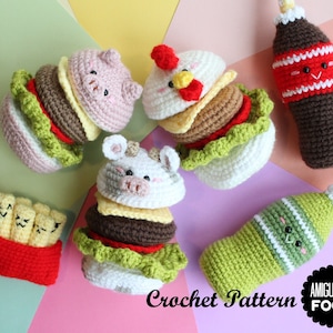 May include: A collection of crocheted amigurumi food items including three animal-themed burgers, a red container of french fries, and two beverage bottles. Each item features embroidered facial expressions. Text reads Crochet Pattern AMIGURUMI FOOD.
