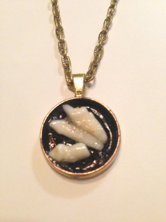 dog tooth pendant