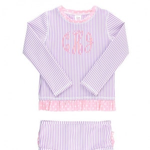 May include: A purple and white striped swimsuit with pink polka dot trim and a ruffle detail. The top has long sleeves and a monogrammed "CJS" on the front.