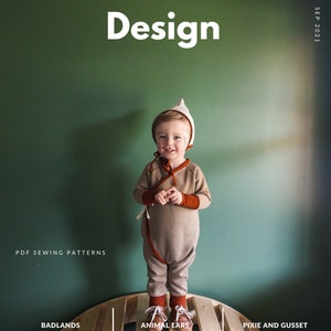 May include: A child wearing a tan jumpsuit with orange trim and a white bonnet with pointy ears stands on a wooden rocker. The text "BADLANDS Multi Option Bonnet NB-5T" is on the left, "ANIMAL EARS Animal ear options include bunny, lamb, bear and more!" is in the middle, and "PIXIE AND GUSSET Pixie and Gusset Bonnet Options" is on the right.