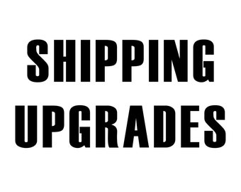 May include: Black and white text on a white background that reads "SHIPPING UPGRADES".
