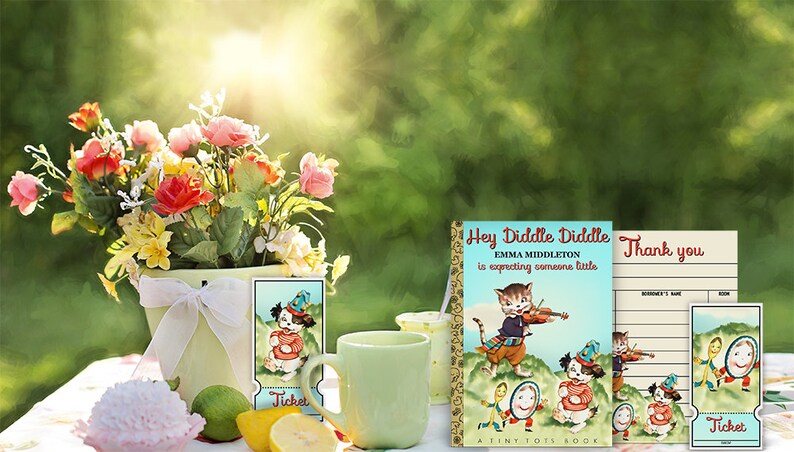 May include: A set of printable party decorations for a baby shower. The decorations feature a vintage illustration of a cat playing a fiddle and a dog holding a drum. The text on the decorations reads "Hey Diddle Diddle Emma Middleton is expecting someone little." and "Thank you".