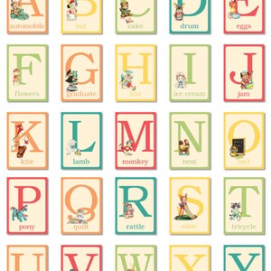 May include: A set of 26 alphabet flashcards featuring colorful illustrations of animals and objects. Each card has a large letter and a corresponding word, such as "A" for "automobile" and "Z" for "zebra".
