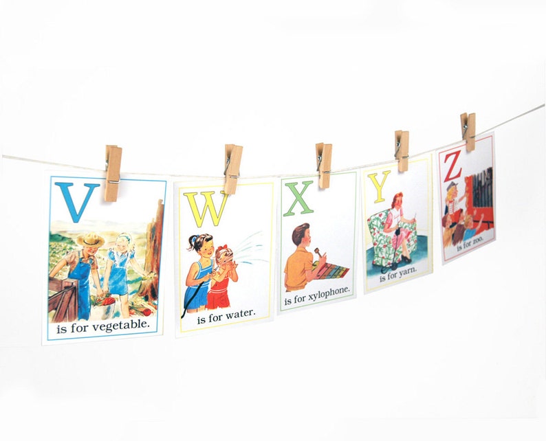 May include: A set of alphabet flashcards with illustrations and the letter and word for each letter. The letters are V, W, X, Y, and Z. The illustrations include a child picking vegetables, a child watering a plant, a child playing a xylophone, a child knitting yarn, and a child playing a musical instrument.