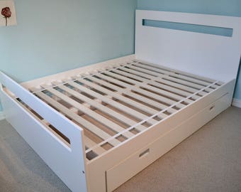 Queen bed with a lovely large storage drawer