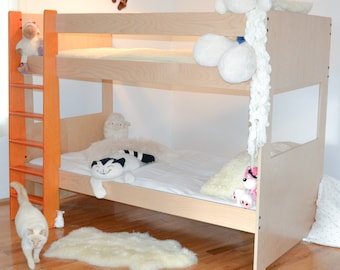 Modern Twin bunk bed with a splash of Orange