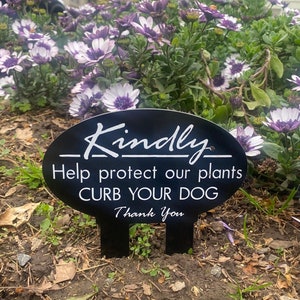 Kindly Help protect our plants Curb your dog Sign