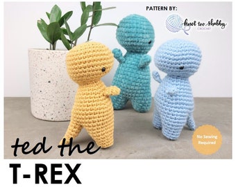 May include: A crochet pattern for a dinosaur toy named Ted the T-Rex. The pattern is by Knot Too Shabby Crochet. The image shows three crocheted dinosaurs in different colours: yellow, blue, and green.