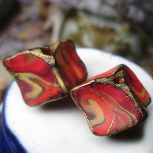 Polymer Clay Bead Pair - 2 Rustic Pinched Curvy Diamond Blocks - Cane Swirls w GOld Edges - Primitive Nuggets - 424