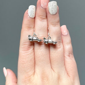 Time traveling car sterling silver plated earrings