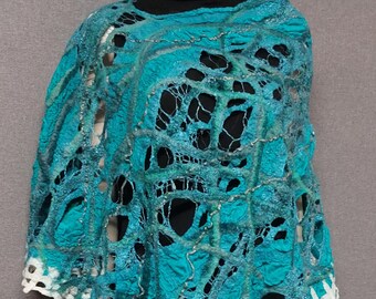 Felted azure bolero, a captivating fusion of turquoise, blue and white, crafted to inspire.