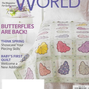 Könnte beinhalten: Ein Magazin-Cover für Quilter's World, das eine Steppdecke mit einem Schmetterlingsmuster zeigt. Der Titeltext lautet "Butterflies Are Back!" und "Think Spring Showcase Your Piecing Skills".