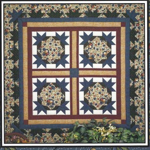 Pode incluir: Um livro de padrões de colchas intitulado Flower Market Quilts por Thimbleberries by Lynette Jensen, apresentando um design de colcha quadrada com quatro blocos de tecido floral rodeados por pontas de estrela azul-marinho, bordas douradas e uma moldura vermelha escura.