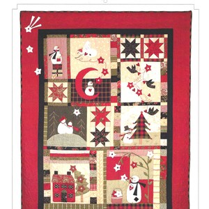 May include: A rectangular quilt featuring a red border and a central grid of blocks with Christmas-themed appliqués including snowmen, stars, birds, trees, and a house. The text "Bunny Hill Designs" and "Catch A Christmas Star" appear on the page.