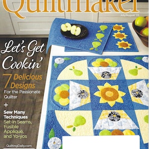 Könnte beinhalten: Ein Magazin-Cover für Quiltmaker, ein Quilt-Magazin, mit dem Titel "Let's Get Cookin'" und einem farbenfrohen Quilt-Design mit Sonnenblumen, Birnen und Äpfeln. Das Cover enthält auch den Text "7 Delicious Designs" und "Sew Many Techniques".