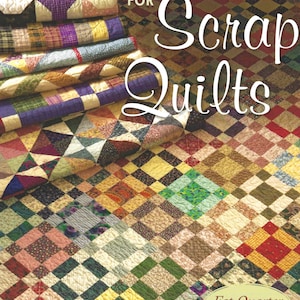 May include: A book titled Simple Strategies for Scrap Quilts by Lynn Roddy Brown, featuring a stack of folded patchwork quilts and a large quilt spread out below, all made from various colourful fabric squares in diverse patterns and textures.