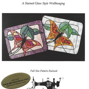 May include: A stained glass style wallhanging pattern featuring two butterflies with colourful wings. The pattern is titled "Butterfly Spring" and "The Not-So-Pale Swallowtail".