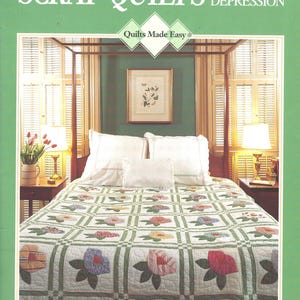 May include: A book cover titled "Scrap Quilts From The Depression" with a green border. The image shows a bed with a floral quilt in shades of red, blue, and yellow. The quilt is on a bed with white pillows and a wooden canopy.
