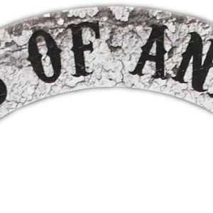 May include: A white patch with a black distressed font that reads "Sons of Anakin".