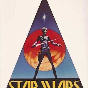 May include: A vintage poster for the film Star Wars featuring a blue and red illustration of a person holding a lightsaber in front of a planet. The text "STAR WARS" is in yellow letters at the bottom of the poster.