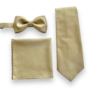 Champagne/gold bow tie and cream/beige suspenders set. Kids/Adults