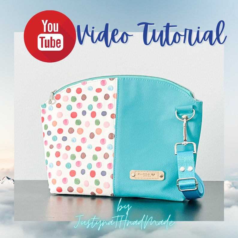 May include: A turquoise and white polka dot crossbody bag with a silver zipper and a silver clasp. The bag has a removable strap and a small metal plate with the text "HandMade" on it. The bag is on a black surface with a white background. "Video Tutorial by Justyna HandMade" is written in blue text on the image.