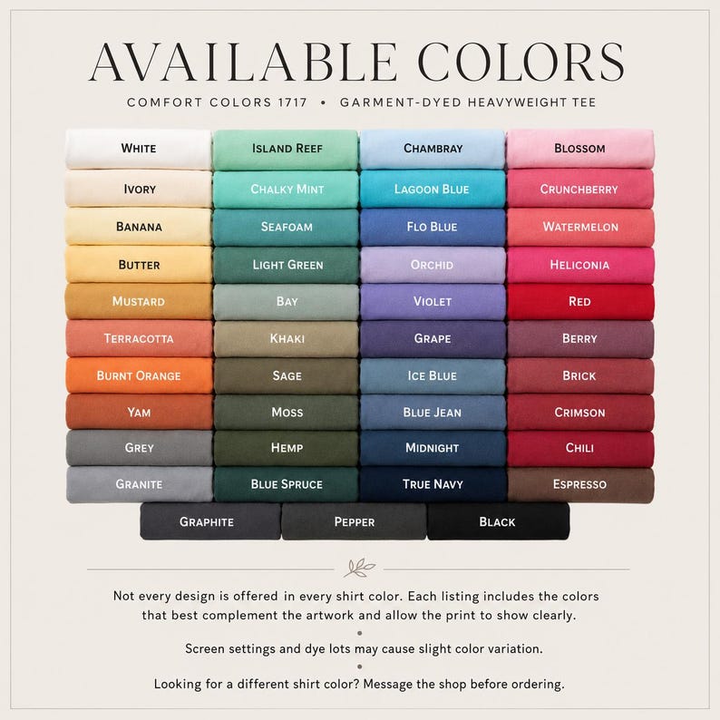 May include: A color chart for Comfort Colors 1717 garment-dyed heavyweight t-shirts, displaying a grid of folded fabric swatches in various shades including white, yellow, green, blue, pink, red, grey, and black, with text labels for each color.