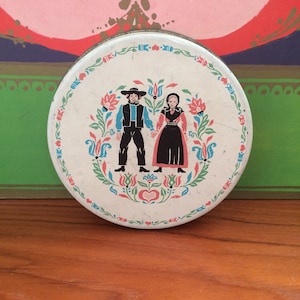 Small Vintage Round Pennsylvania Dutch Tin Container with Pink and Blue Accents