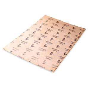 May include: A sheet of brown paper with a repeating pattern of a witch and the text "KORES 5010".
