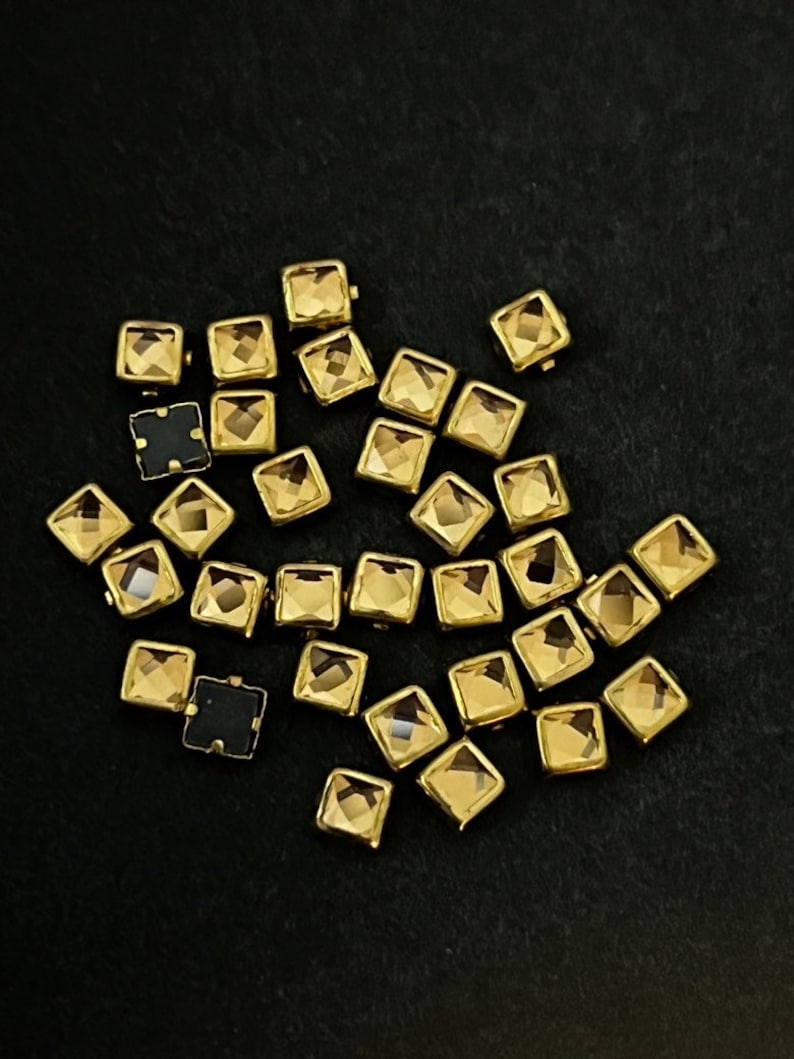 Glue-on Kundan stones
Flat back Kundan stones
Kundan stones for jewelry
Kundan embellishments
DIY Kundan stones
Flat back rhinestones
Kundan stones for crafts
Glue-on rhinestones
Decorative Kundan stone
High-quality Kundan stones, diy embellishments