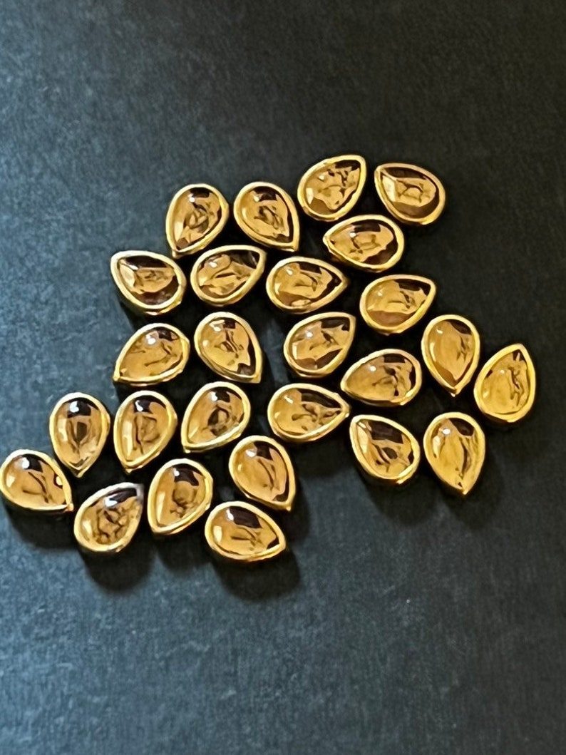 Glue-on Kundan stones
Flat back Kundan stones
Kundan stones for jewelry
Kundan embellishments
DIY Kundan stones
Flat back rhinestones
Kundan stones for crafts
Glue-on rhinestones
Decorative Kundan stone
High-quality Kundan stones, diy embellishments