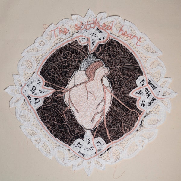 The stitched heart (2018).  Freehand machine stitching on Chinese silk and vintage handmade lace.