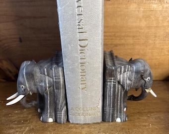 Sujetalibros antiguos de ébano de Coromandel tallado con forma de elefante indio.