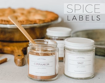 May include: Three glass jars with white lids and labels. The labels are white with black text and say "Hand Poured", "Cinnamon", "Spice Collection", "Premium Quality", "Salt", and "Spice Collection".