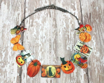 vintage halloween postcard image necklace cat pumpkin witch little girl butterfly