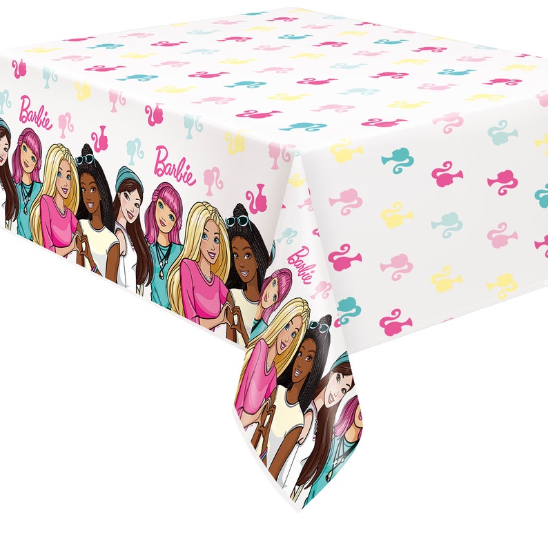 May include: A white plastic tablecloth with a repeating pattern of pink, blue, and yellow silhouettes of Barbie dolls. The border of the tablecloth features a group of diverse Barbie dolls with the word "Barbie" printed three times.