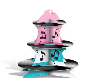 May include: A three-tiered cupcake stand shaped like a record player. The stand is pink, blue, and black with musical notes printed on each tier.