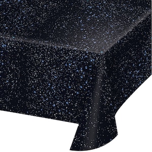 May include: Black plastic tablecloth with a blue and white starry night design.
