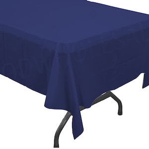 May include: A navy blue plastic tablecloth. The tablecloth is draped over a table and has a smooth, wrinkle-free surface.