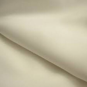 May include: A close-up shot of a folded, off-white fabric. The material appears smooth and drapes softly, with subtle shadows and highlights suggesting its texture and form. The fabric's neutral color and gentle folds create a sense of elegance and simplicity.
