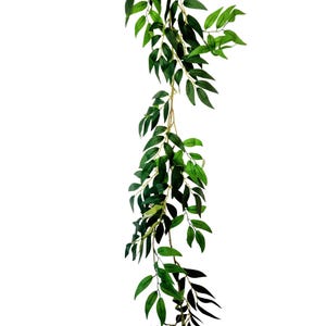 May include: A long, green artificial vine with leaves that are a mix of light and dark green. The vine is perfect for adding a touch of greenery to any space.