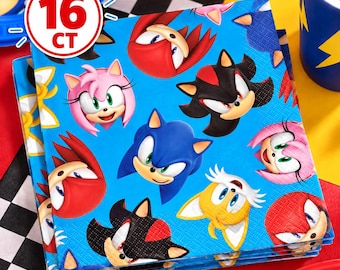 May include: A stack of square paper napkins featuring a repeating pattern of Sonic the Hedgehog characters including Sonic, Tails, Knuckles, Amy Rose, and Shadow on a bright blue background. A circular white badge displays the text 16 CT.