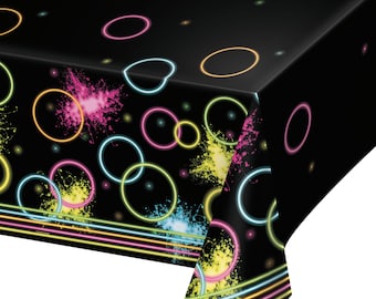 May include: Black plastic tablecloth with a neon glow-in-the-dark design. The design features colorful circles and paint splatters.