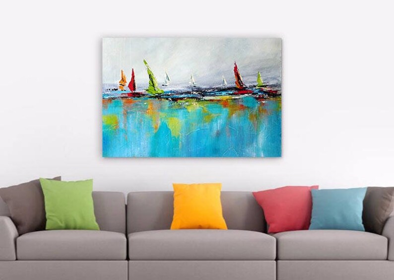 May include: Abstract painting of sailboats on a turquoise blue water surface with a white and gray sky. The sailboats are red, green, orange, and white.